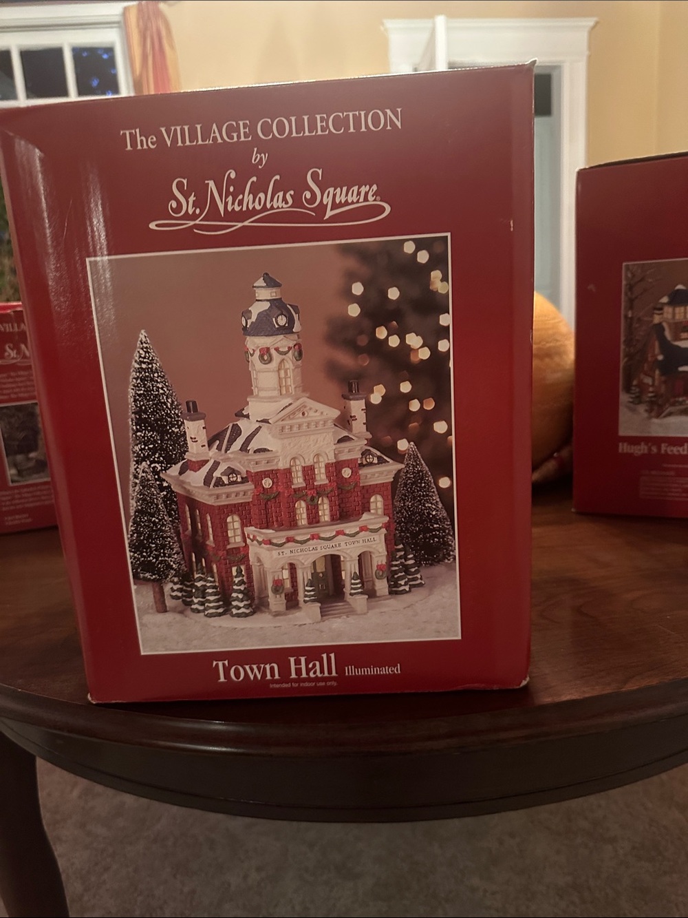 St. Nicholas Square Red and White Illuminated Town Hall Holiday Decor
